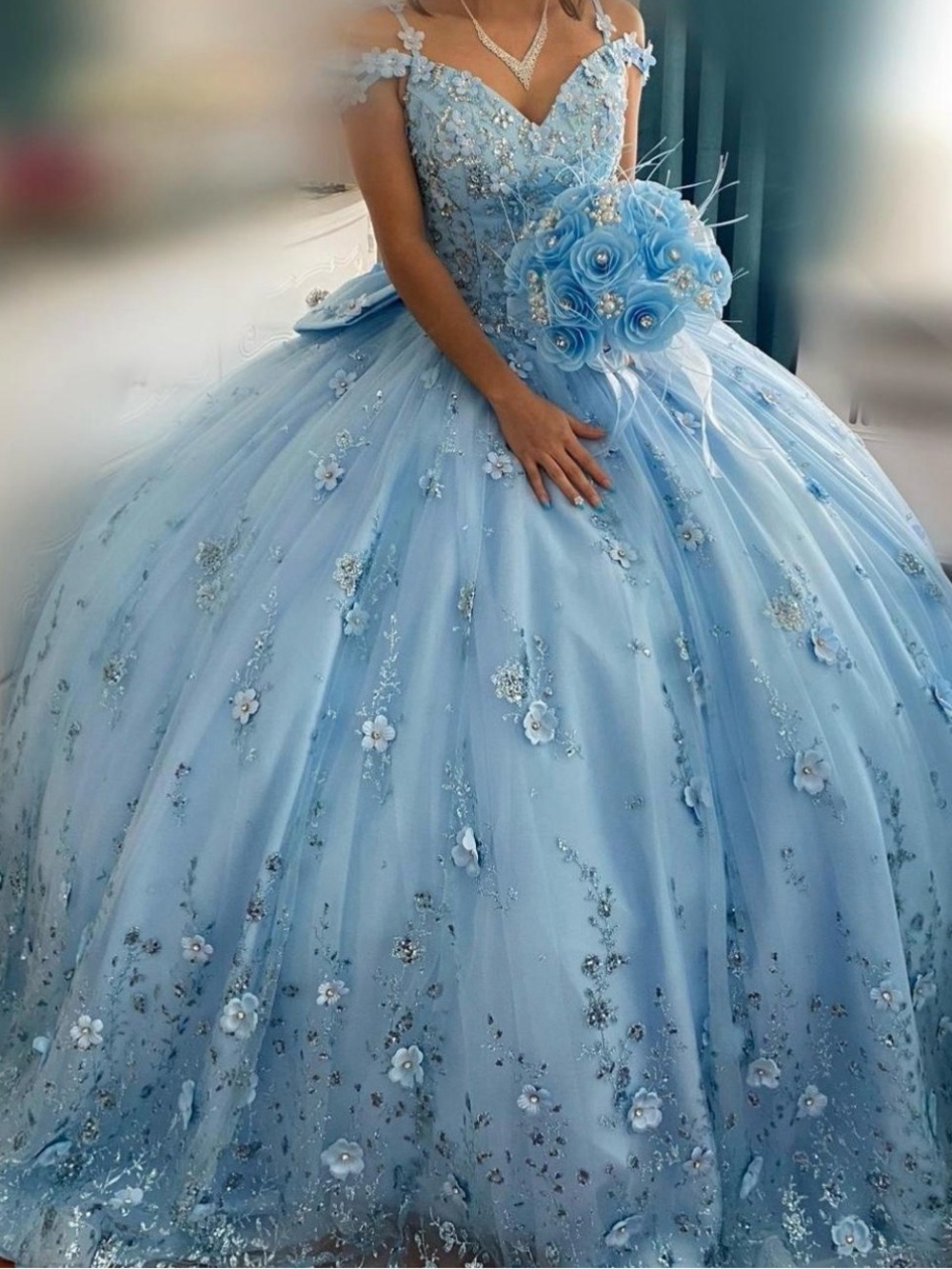 Sky Blue Off-Shoulder Ball Gown with Floral Appliqué